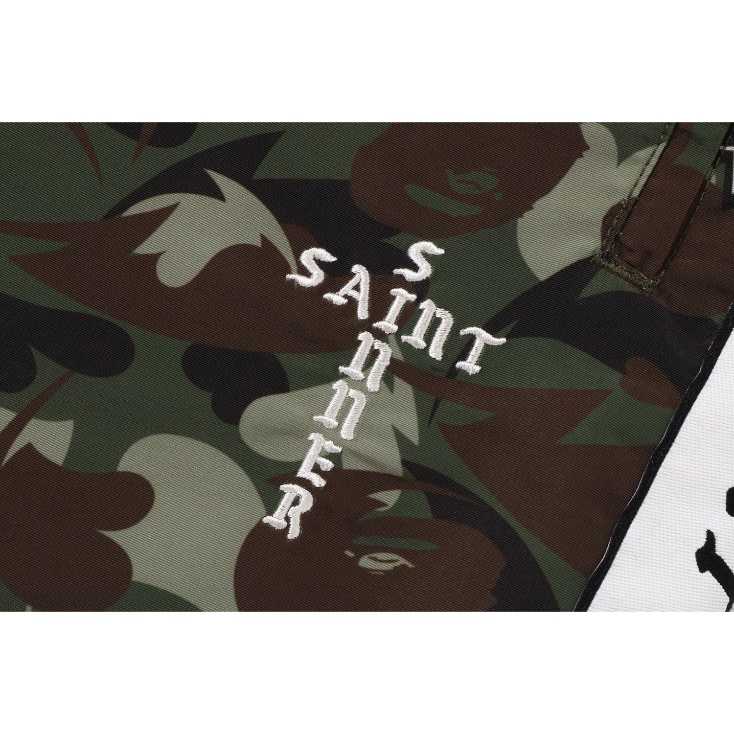 X SAINT MXXXXXX HEART CAMO TRACK PANTS MENS