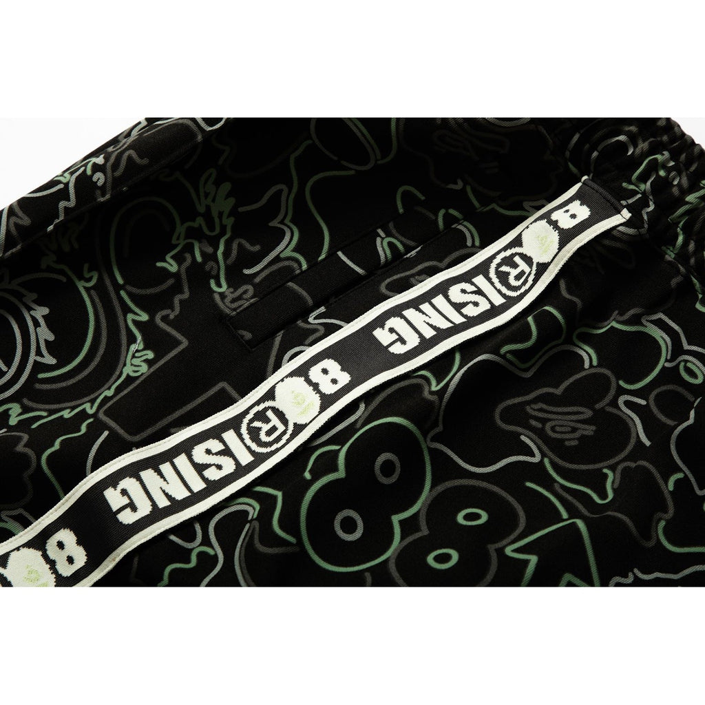 X 88RISING GLOW IN THE DARK CAMO TRACK PANTS MENS