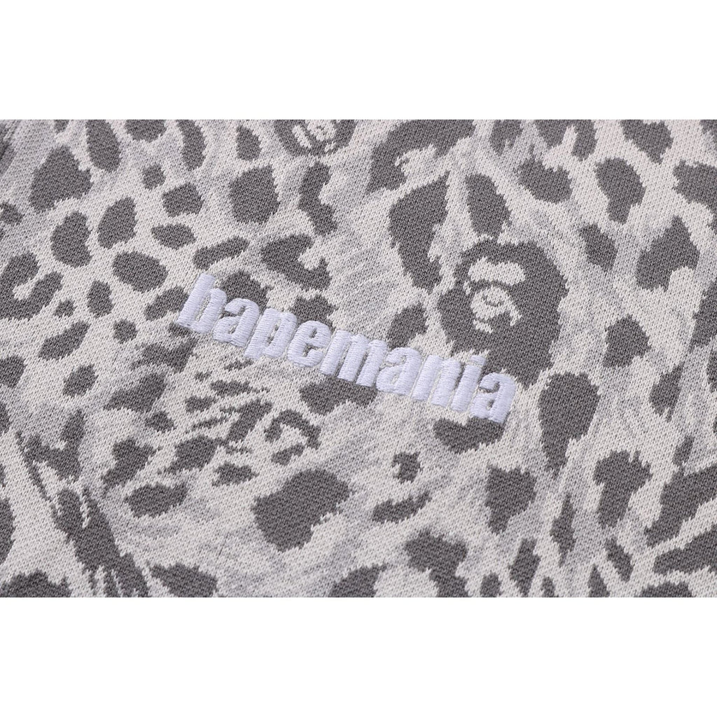 WILD LEOPARD PATTERN RELAXED FIT HALF ZIP SWEATSHIRT MENS